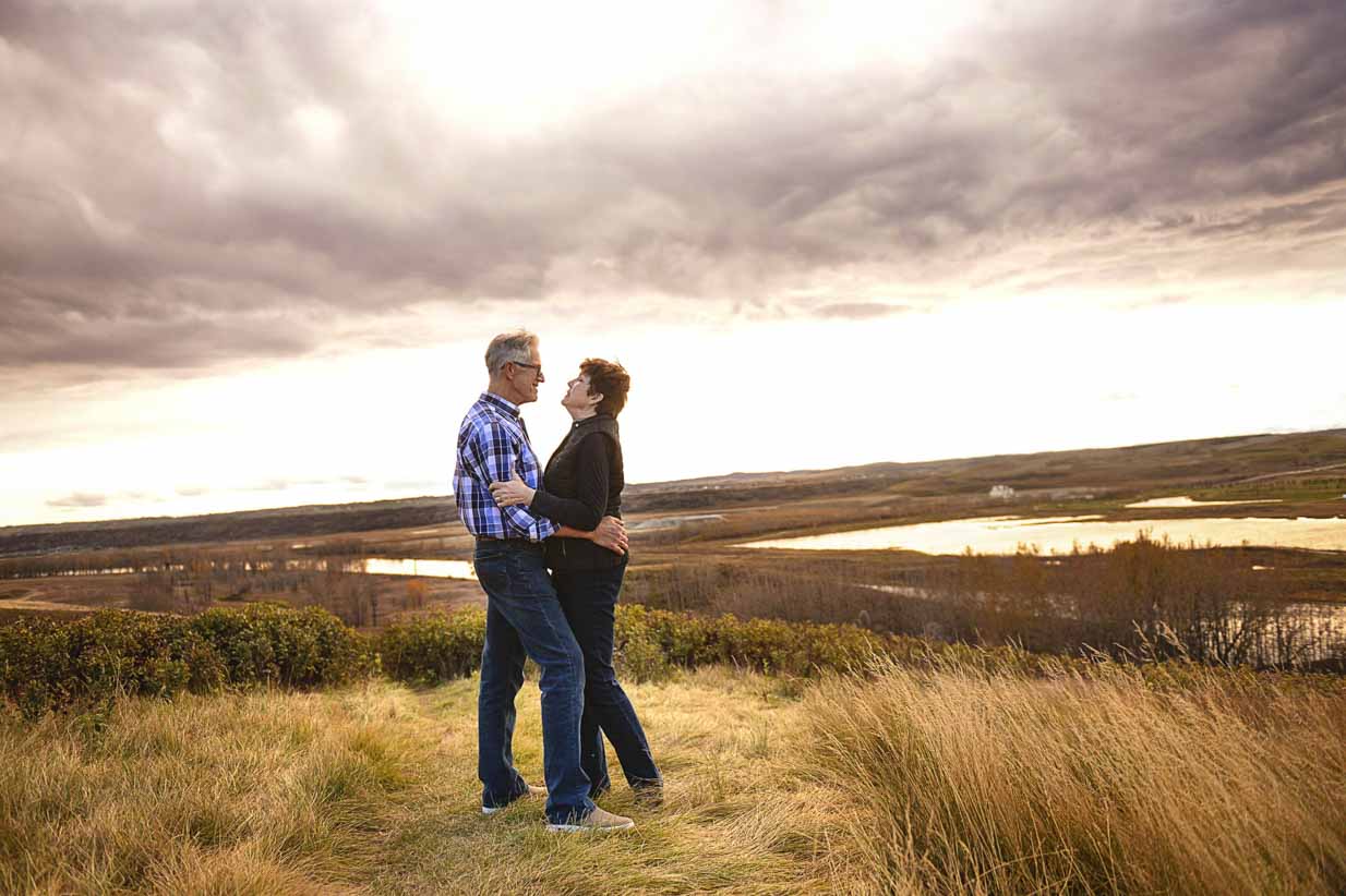 Couple on hill | Calgary Family Photographer | SLIVER Photography