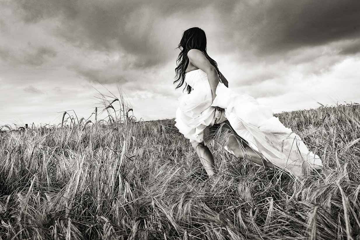 Bride running in field | Destination Wedding Photographer | SLIVER Photography
